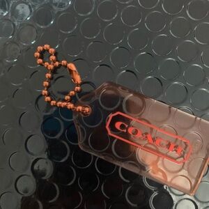 Coach Clear Tag Keychain with Orange Logo